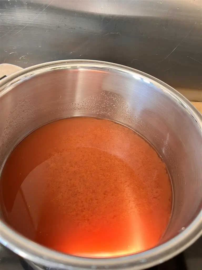 faire réduire le jus des tomates